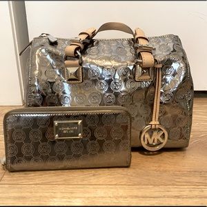 Michael Kors chrome bag and wallet